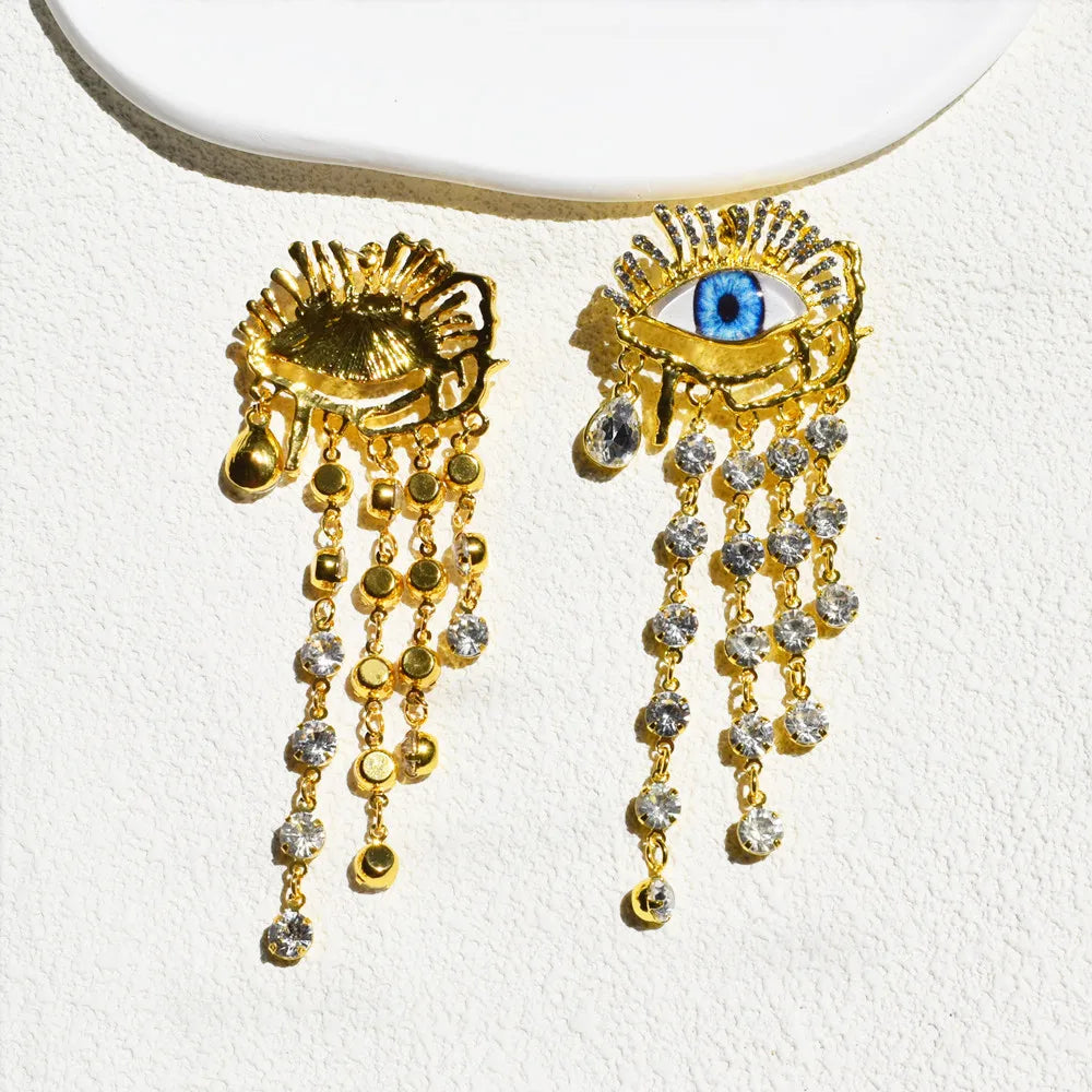 Golden Gaze Ethnic Dangle Earrings