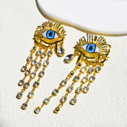 Golden Gaze Ethnic Dangle Earrings